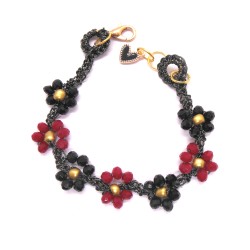 Braccialetto donna con fiori di cristalli neri e rossi intrecciati con filo per gioielli