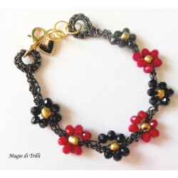 Braccialetto donna con fiori di cristalli neri e rossi intrecciati con filo per gioielli
