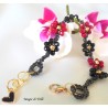 Braccialetto donna con fiori di cristalli neri e rossi intrecciati