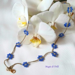 Collana girocollo Fiordaliso con cristalli azzurri e filo dorato