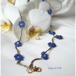 Collana girocollo Fiordaliso con cristalli azzurri e filo dorato